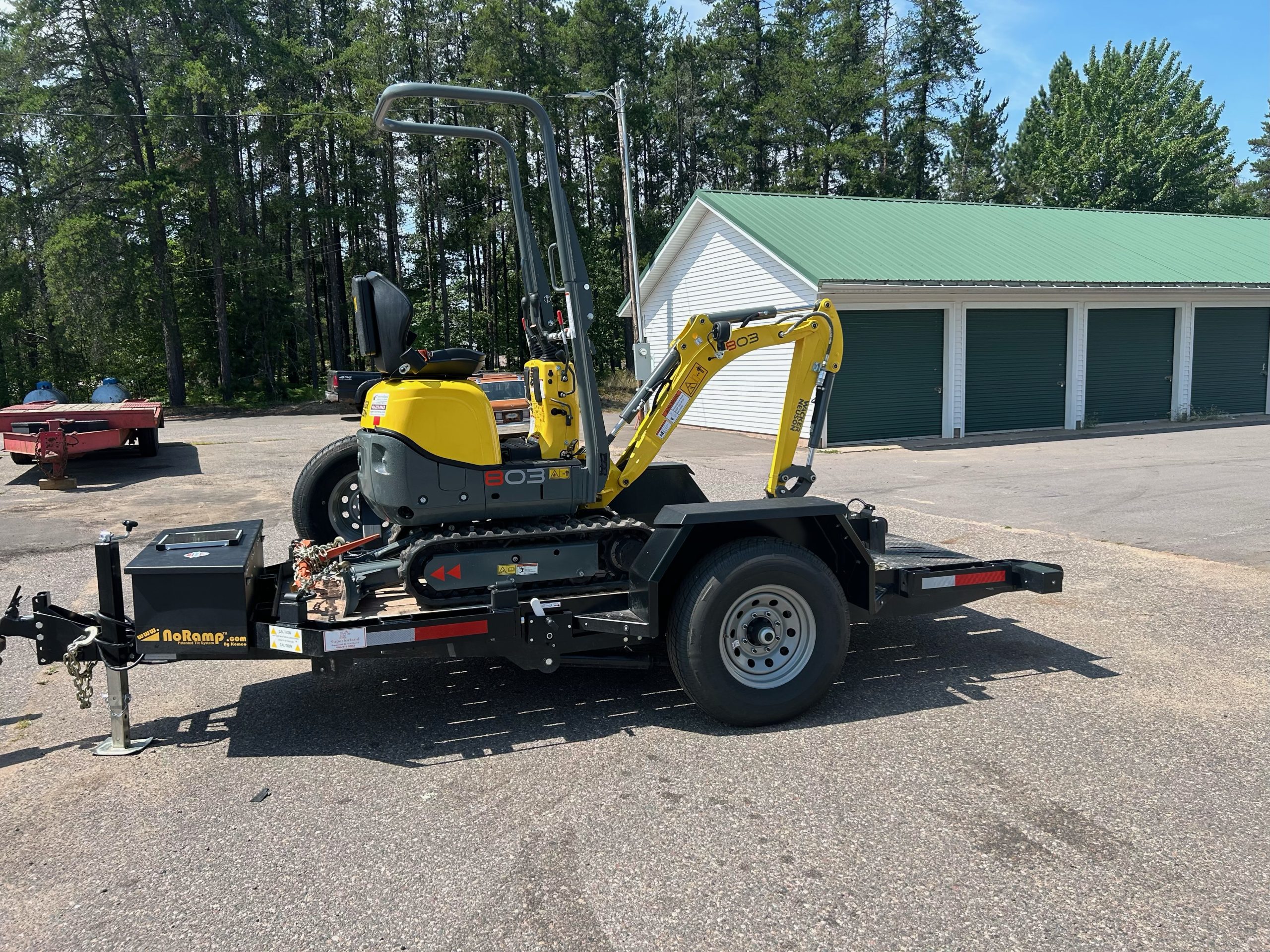 Wacker Neuson 803 Mini Excavator on a flatbed truck