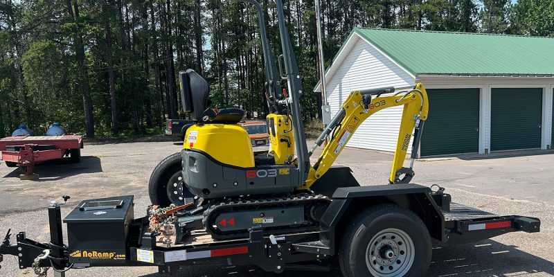 Wacker Neuson 803 Mini Excavator on a flatbed truck