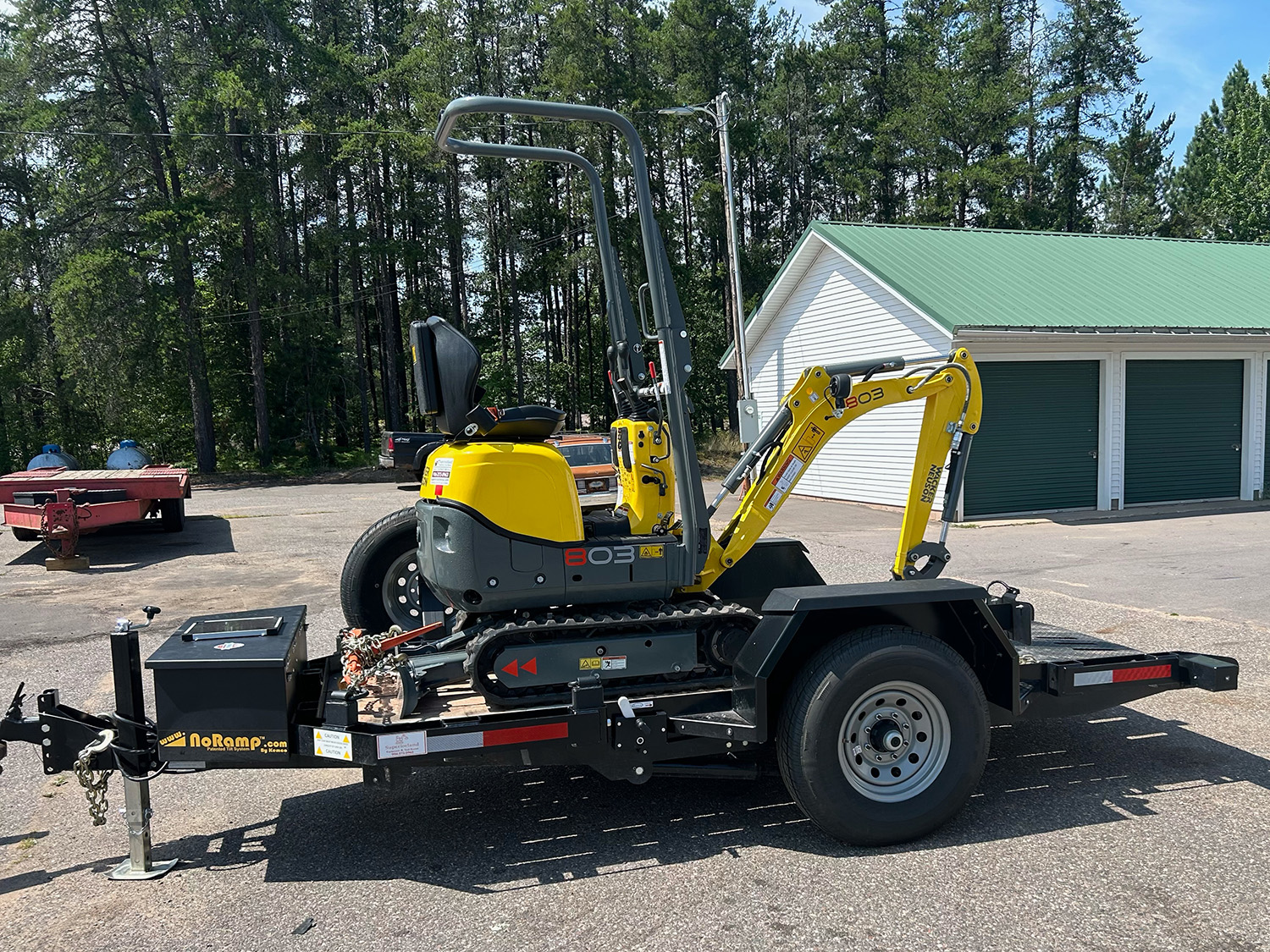 Wacker Neuson 803 Mini Excavator on a flatbed truck